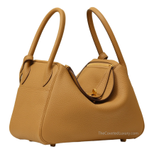 Hermes Lindy 26 Clemence Leather Biscuit Gold Tone Hardware Angled View