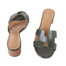 Top and bottom view of jade green lizard leather mule sandals with block heel