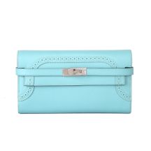 Front view of Hermes Kelly Wallet in macaron blue SW leather